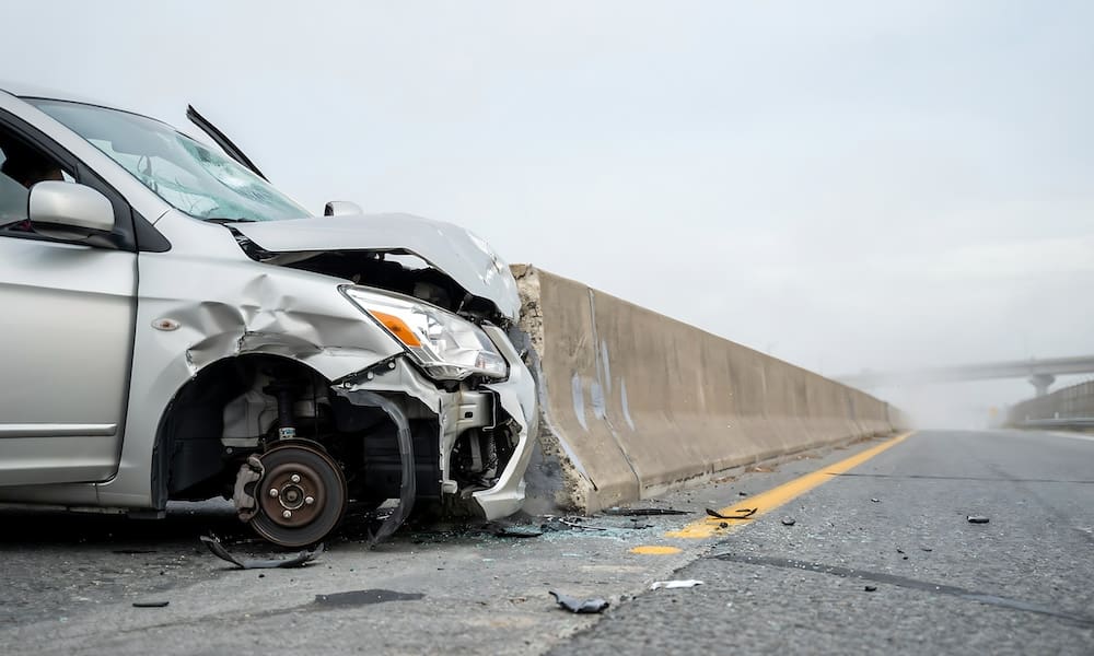 car-crashing-into-median